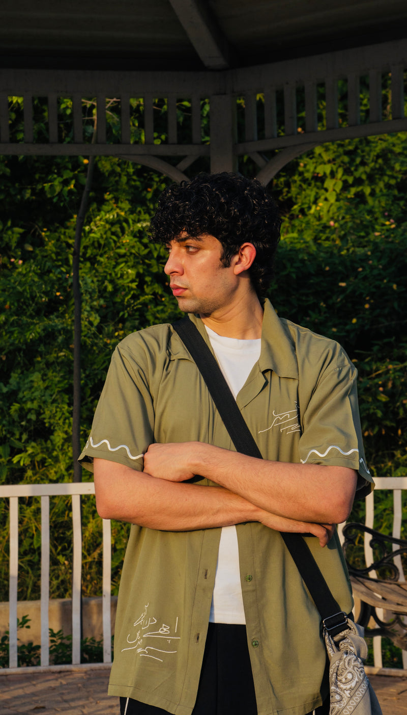 Green button down shirt